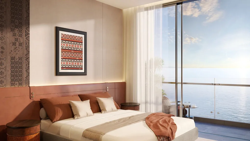 Phối cảnh nội thất phòng ngủ dự án Q Terra Phát Đạt với họa tiết thổ cẩm và view biển